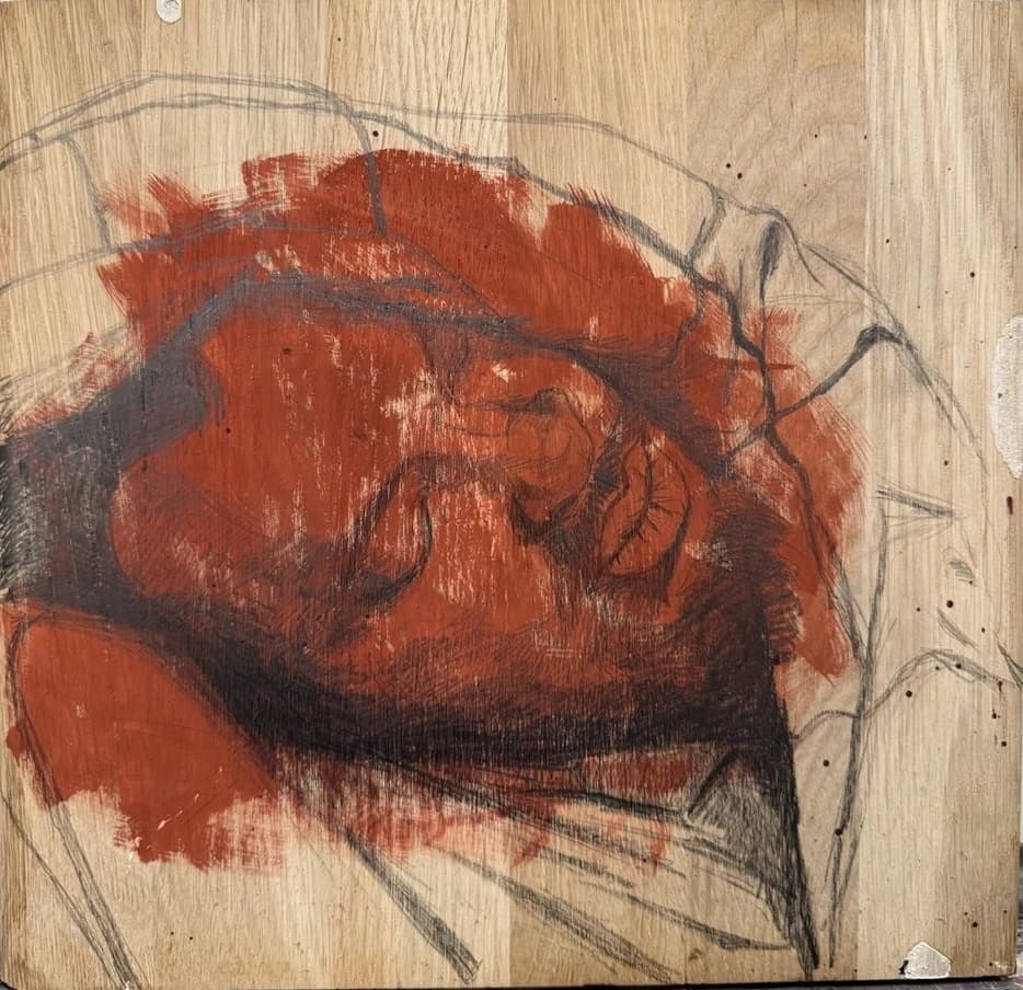 A reclining figure drawn over red brushstrokes on a wood panel.